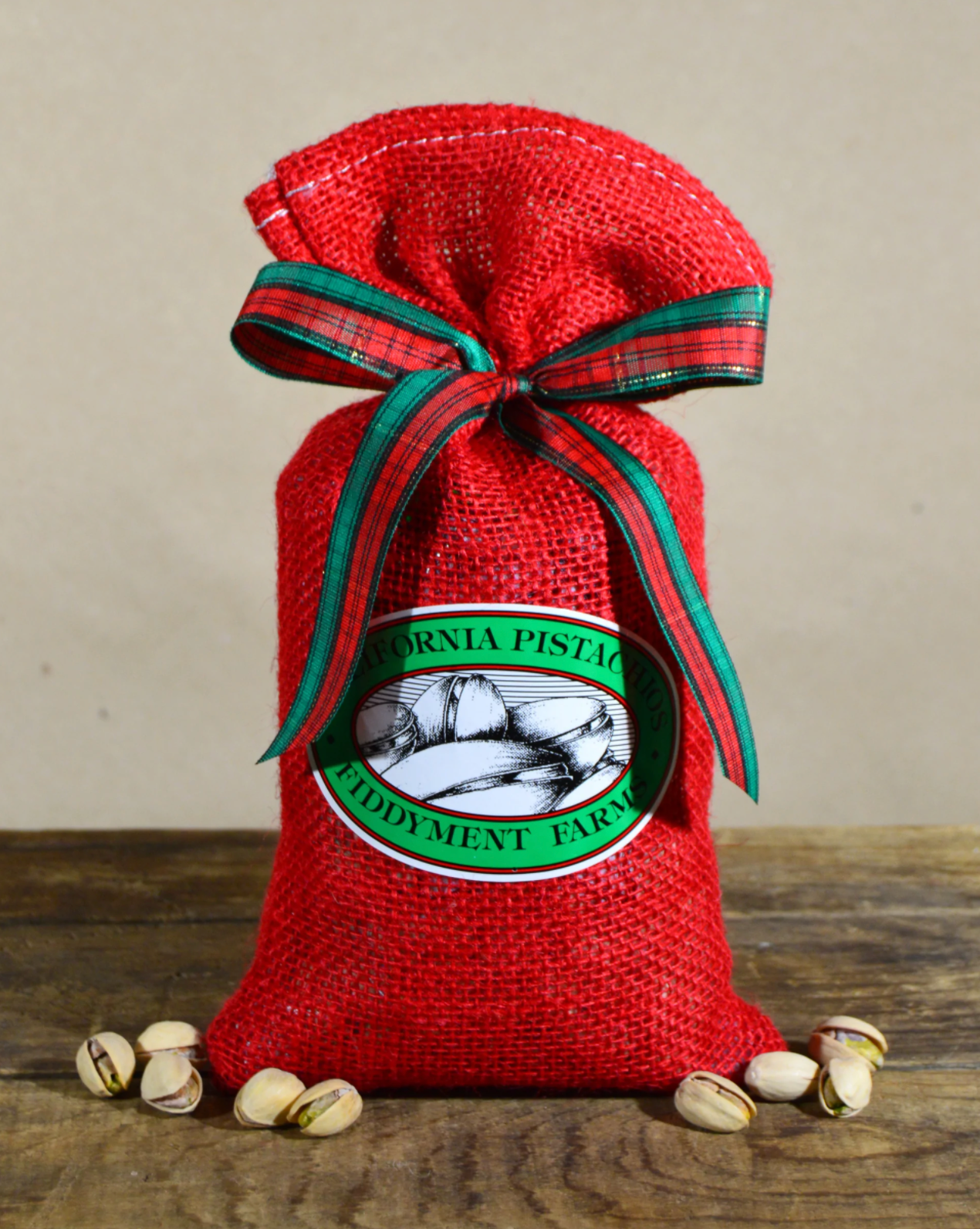 Pistachios in Holiday Bags of red or green burlap